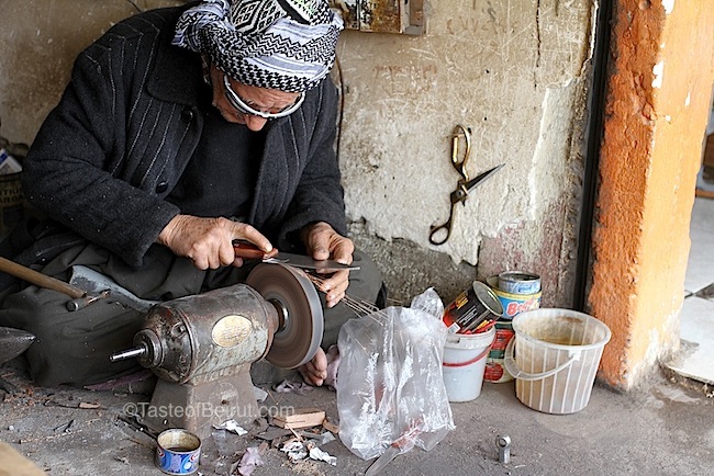 practicing an old trade in Erbil Bazaar