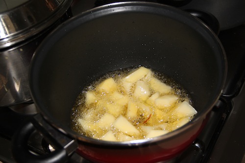 fry potato cubes:potato and kafta stew